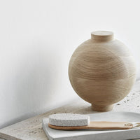 Round wooden vase in natural light wood finish, featuring smooth curved lines and subtle grain patterns.