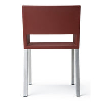 Modern maroon upholstered chair with sleek chrome legs and a minimalist design. Perfect for contemporary interiors.