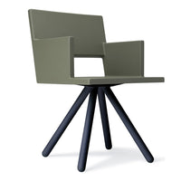 Green modern chair with minimalist design and dark blue legs, perfect for contemporary interiors.