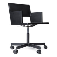 Sleek black swivel chair with minimalist design and smooth matte finish, featuring a geometric shape and no patterns.