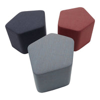 Set of three hexagonal stools in navy, light blue, and burgundy fabric textures. Ideal for modern decor.