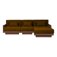 Brown velvet sofa with square cushions, featuring a sleek, modern design and minimalist wooden base.