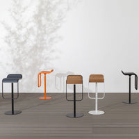 Colorful modern bar stools featuring orange, brown, black, and white finishes with sleek, contemporary designs.
