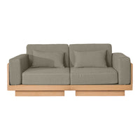 Gray upholstered sofa with clean lines and natural wood frame, featuring a minimalist and modern design.