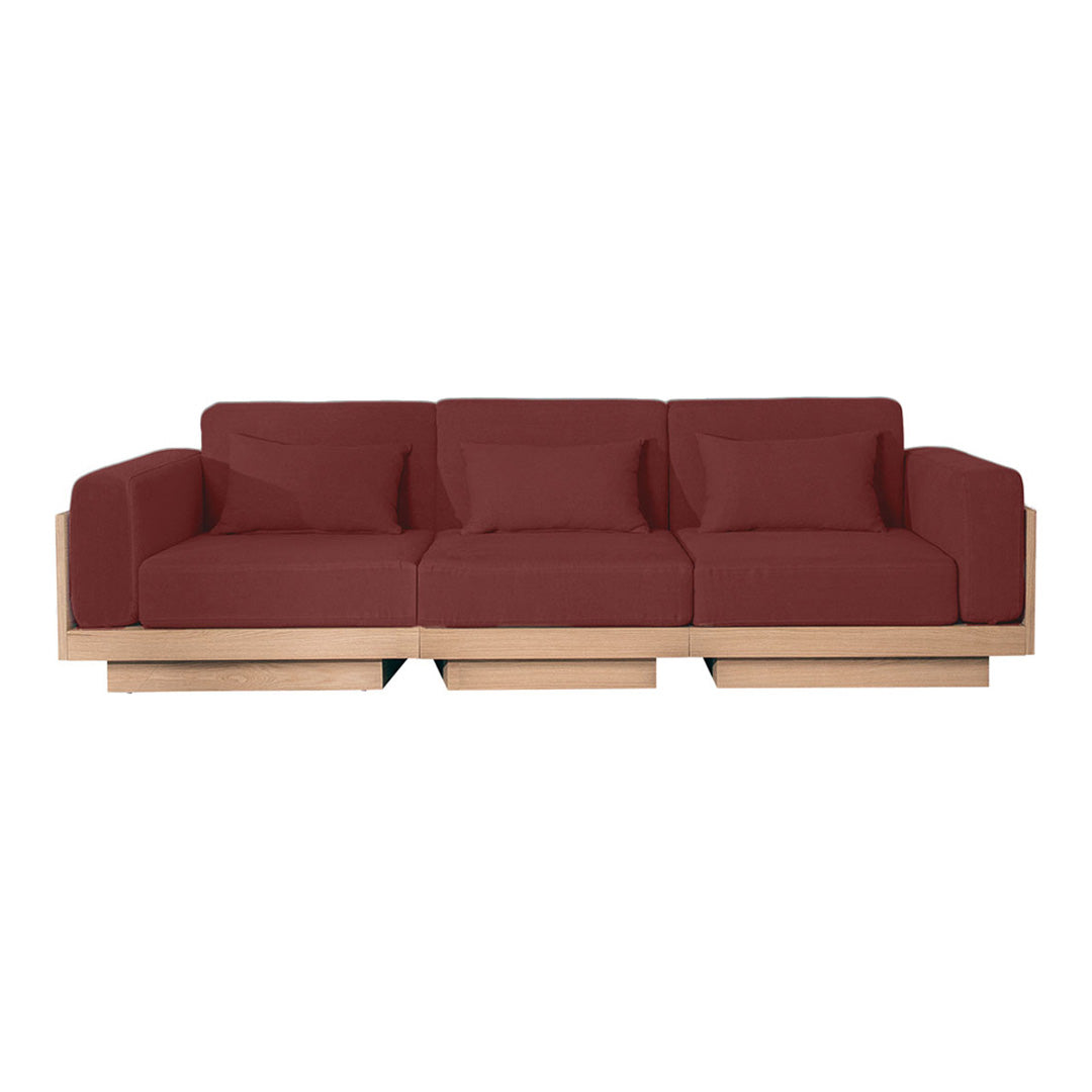 Modern three-seat sofa with a rich burgundy fabric upholstery and sleek wooden base for a stylish touch.