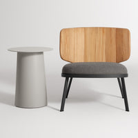 Modern gray chair with wooden backrest and sleek black legs, paired with a minimalist gray side table.