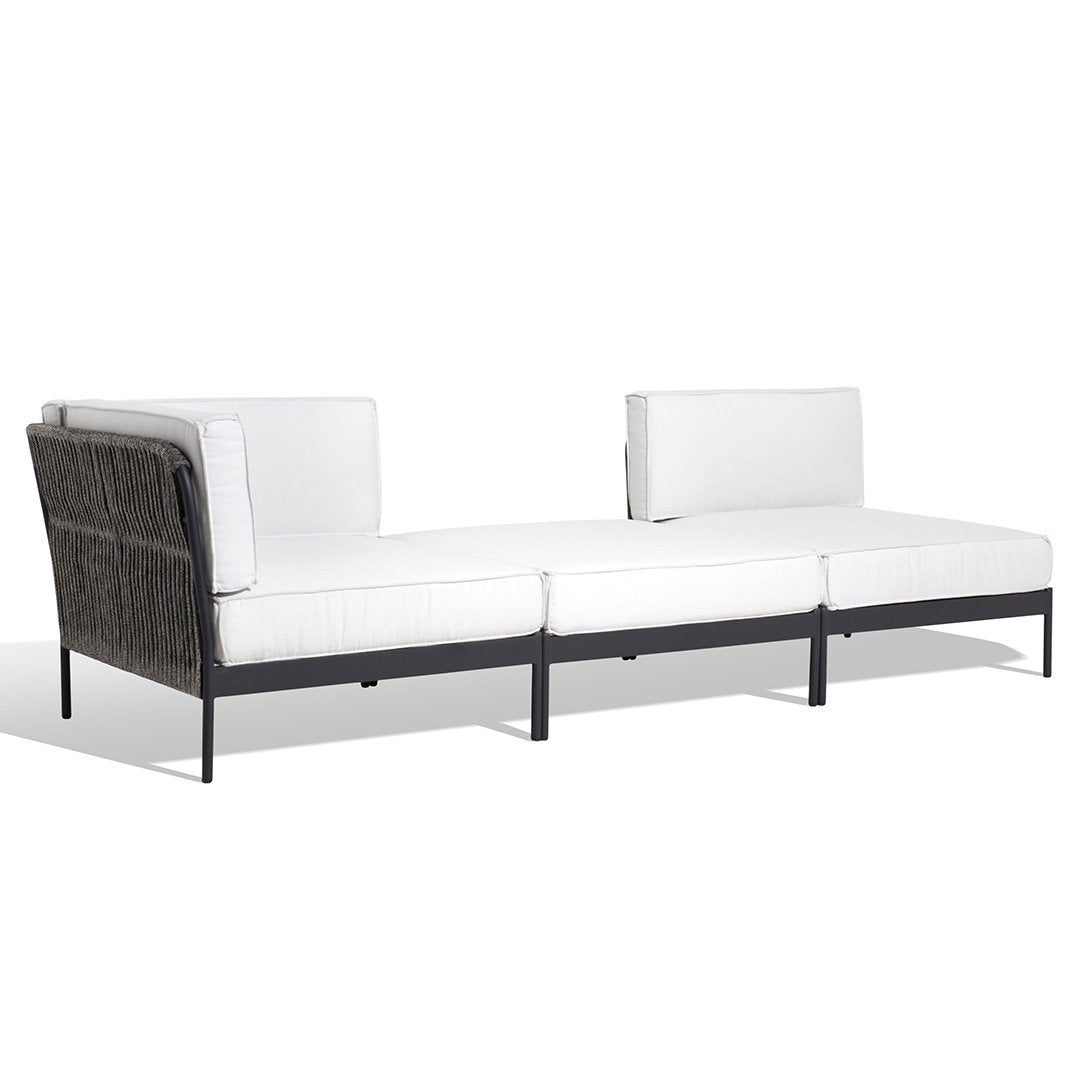Modern sectional sofa with white cushions and dark woven accents on a sleek black frame. Perfect for stylish outdoor spaces.