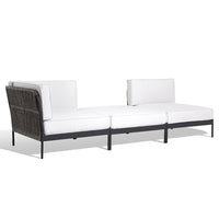 Modern sectional sofa with white cushions and dark woven accents on a sleek black frame. Perfect for stylish outdoor spaces.