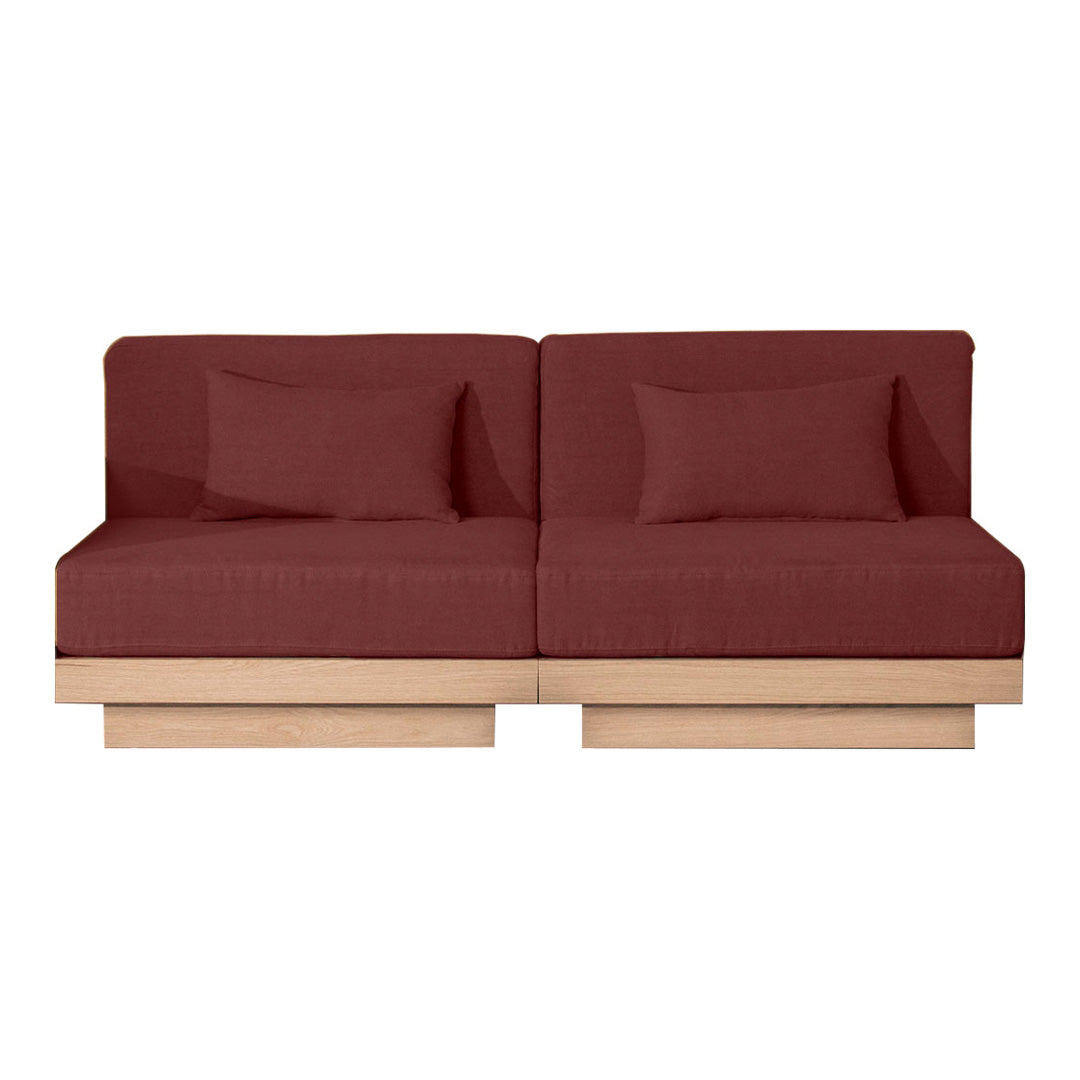 Rust-colored two-seater sofa with smooth fabric and light wooden base, minimalistic design. Perfect for modern interiors.