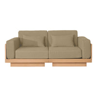 Beige upholstered sofa with clean lines and wooden base, featuring solid color cushions. Perfect for modern decor.
