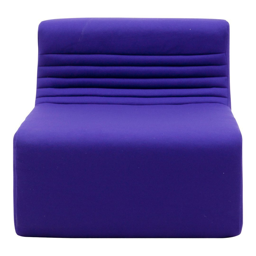 Purple lounge chair with a sleek, modern design and horizontal ribbed pattern on the backrest.