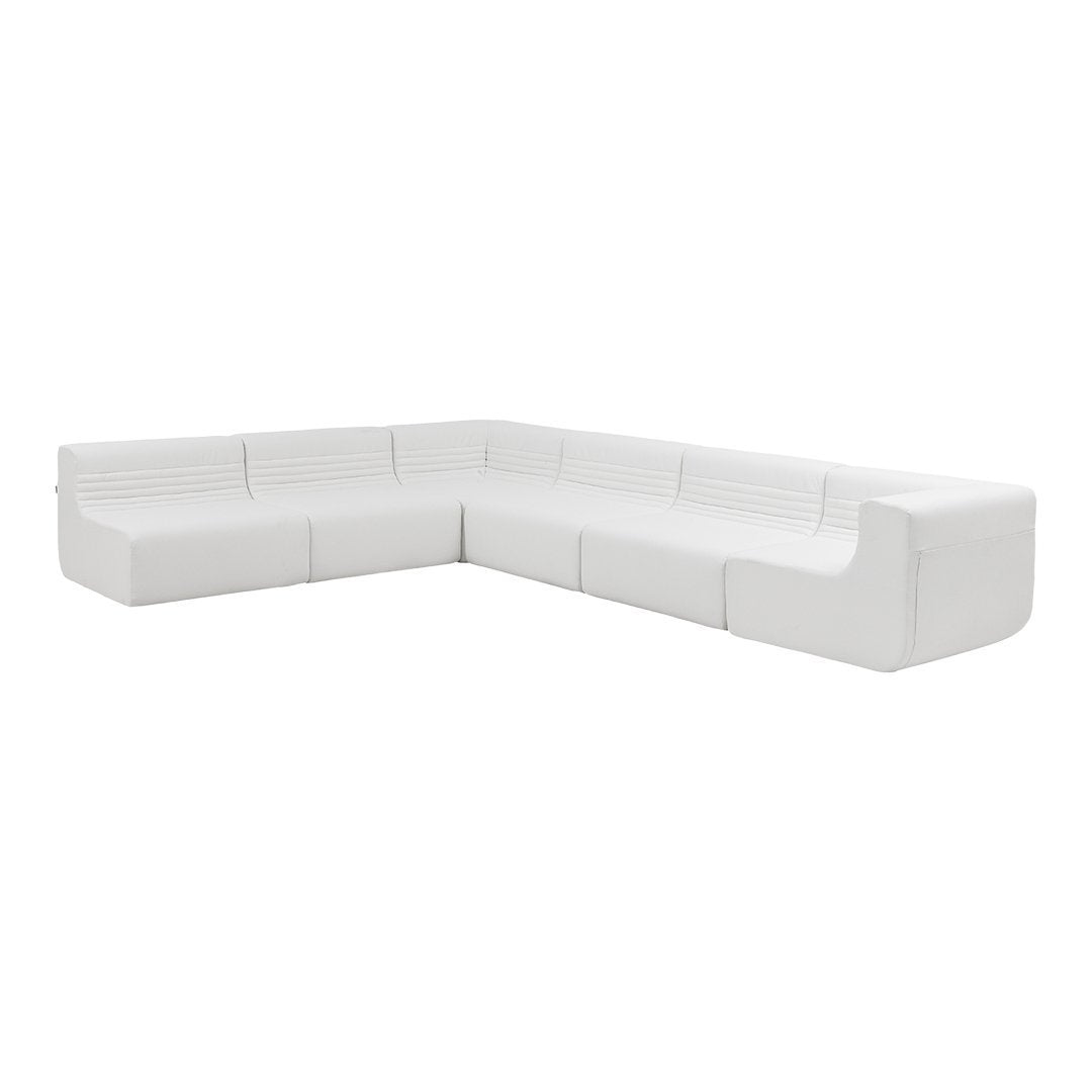 Modern white sectional sofa with sleek lines and minimalistic design, perfect for contemporary living spaces.