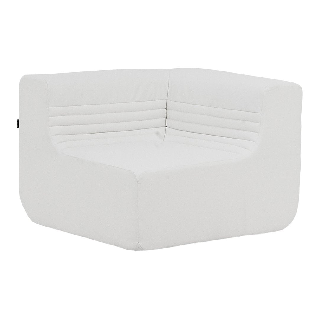 White corner couch with subtle ribbed pattern, featuring a sleek, minimalist design for modern interiors.