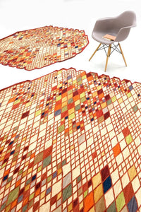Colorful geometric rugs featuring vibrant squares and diamond patterns in warm hues of orange, red, and yellow.