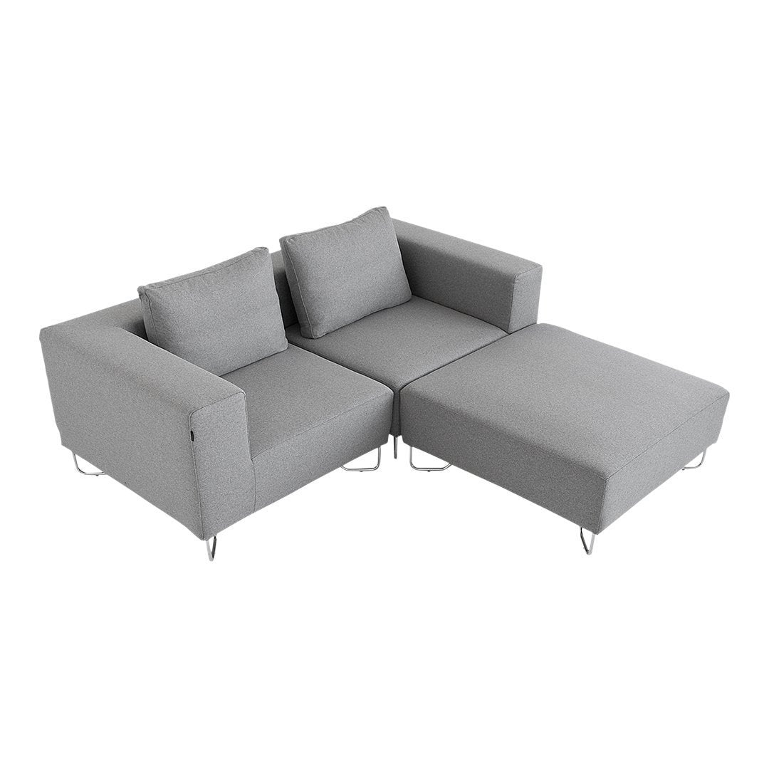 Gray upholstery sofa with clean lines and subtle texture, featuring a modern minimalist design.