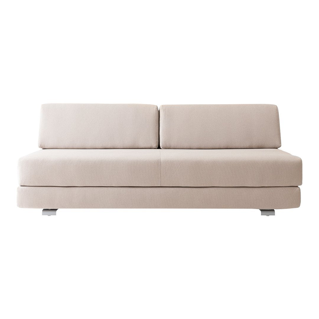 Neutral beige sofa with a sleek, minimalist design and smooth fabric surface, perfect for modern interiors.