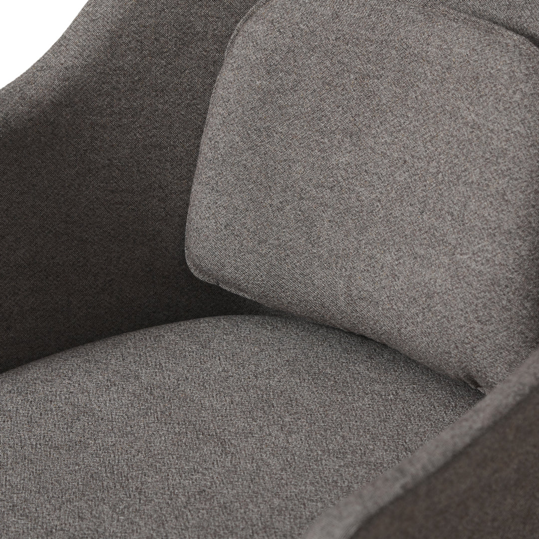 Gray upholstered chair featuring a textured pattern with a contrasting lighter gray cushion. Modern and stylish design.