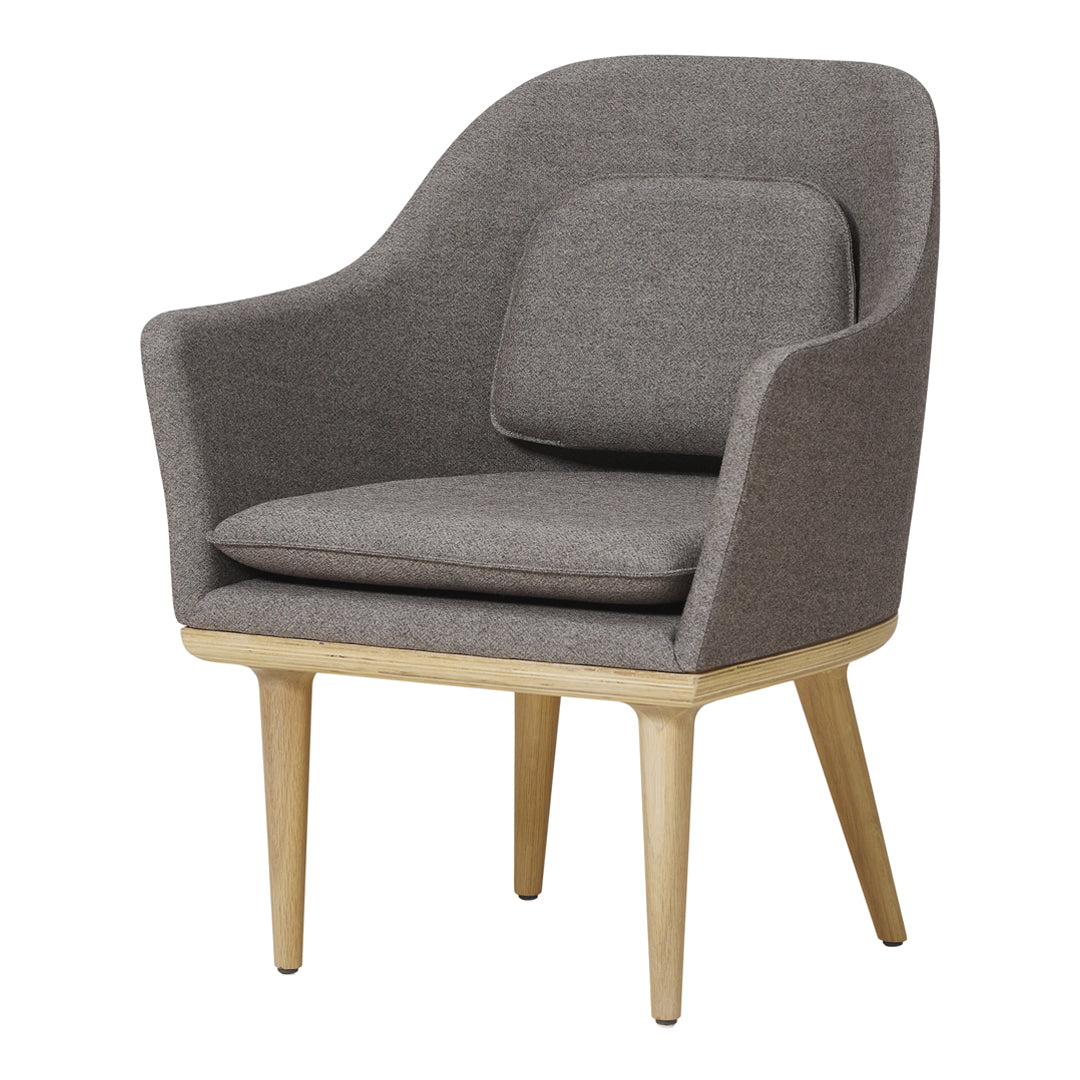Gray upholstered armchair with a smooth, modern shape and natural wood legs, featuring a minimalist design.