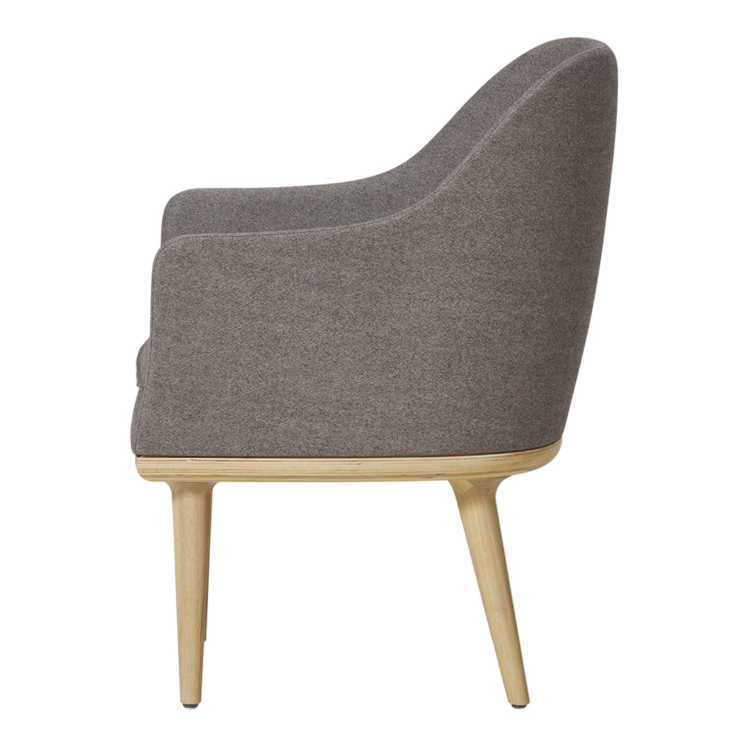 Light gray upholstered chair with a smooth texture and natural wood legs. Modern design, neutral tones.