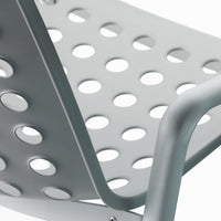 Gray metal chair with a minimalist design featuring polka dot holes for ventilation and a sleek modern look.