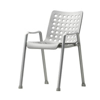 Gray plastic chair with a modern design featuring circular perforations for ventilation and comfort. Perfect for indoor/outdoor use.