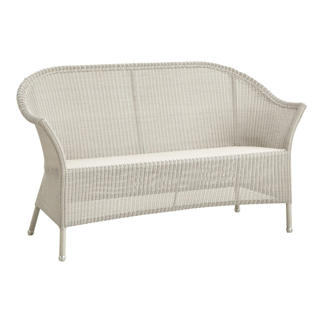 White woven loveseat with a curved back and sleek design, perfect for outdoor or indoor seating.