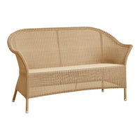 Light brown wicker sofa with a smooth, curved design and a woven texture. Ideal for indoor or outdoor spaces.