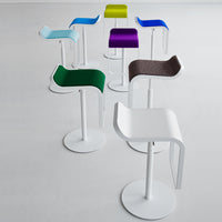 "Colorful modern bar stools in assorted shades of blue, green, purple, and white with smooth and textured finishes."