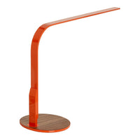 Modern orange desk lamp with a sleek, curved design and a round wooden base. Ideal for stylish home offices.