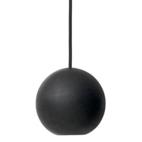 Matte black spherical pendant light with a smooth surface and minimalistic design. Ideal for modern interiors.