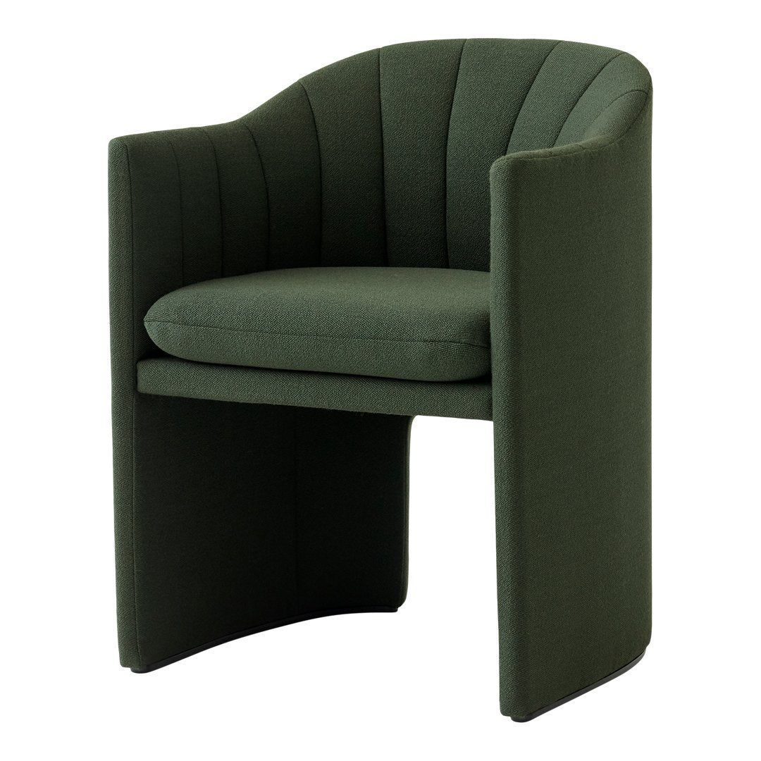 Green upholstered accent chair with vertical ribbed pattern and modern design, perfect for contemporary decor.