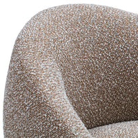 Textured fabric chair in warm beige and cream tones with a speckled pattern. Perfect for modern decor.