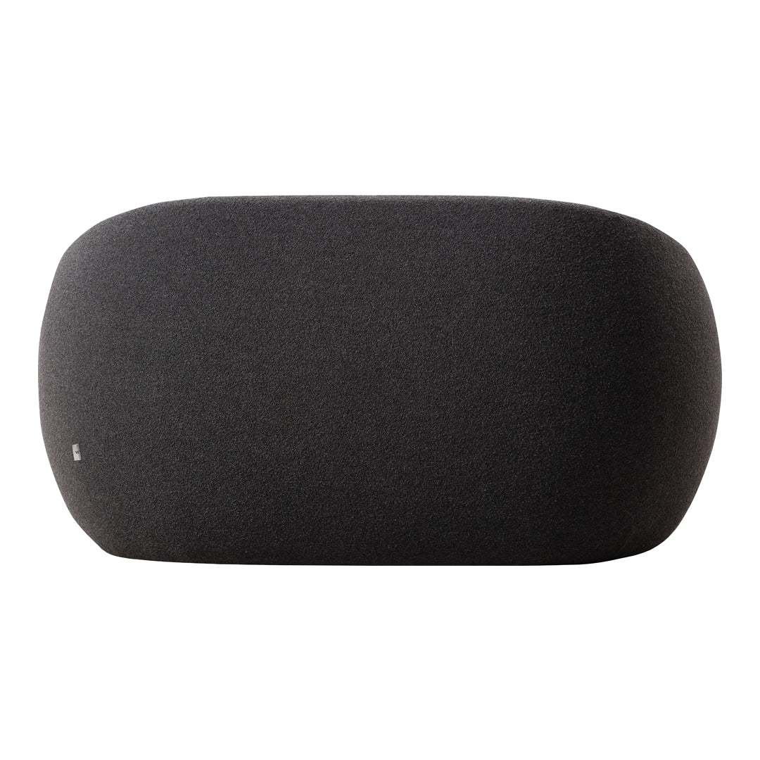 Black fabric speaker with a sleek oval shape and a textured finish, perfect for modern decor. 