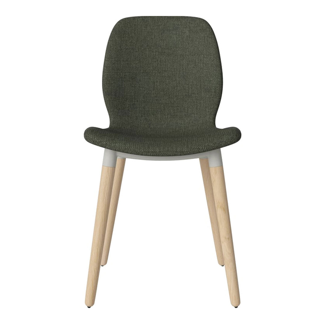 Olive green upholstered chair with light wood legs and gray accents, featuring a modern, textured pattern.