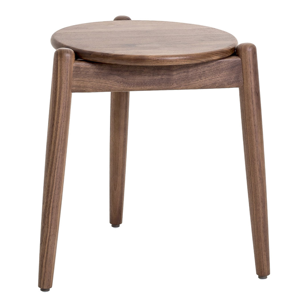 Round wooden stool in rich walnut finish, showcasing a smooth top and sleek, tapered legs.