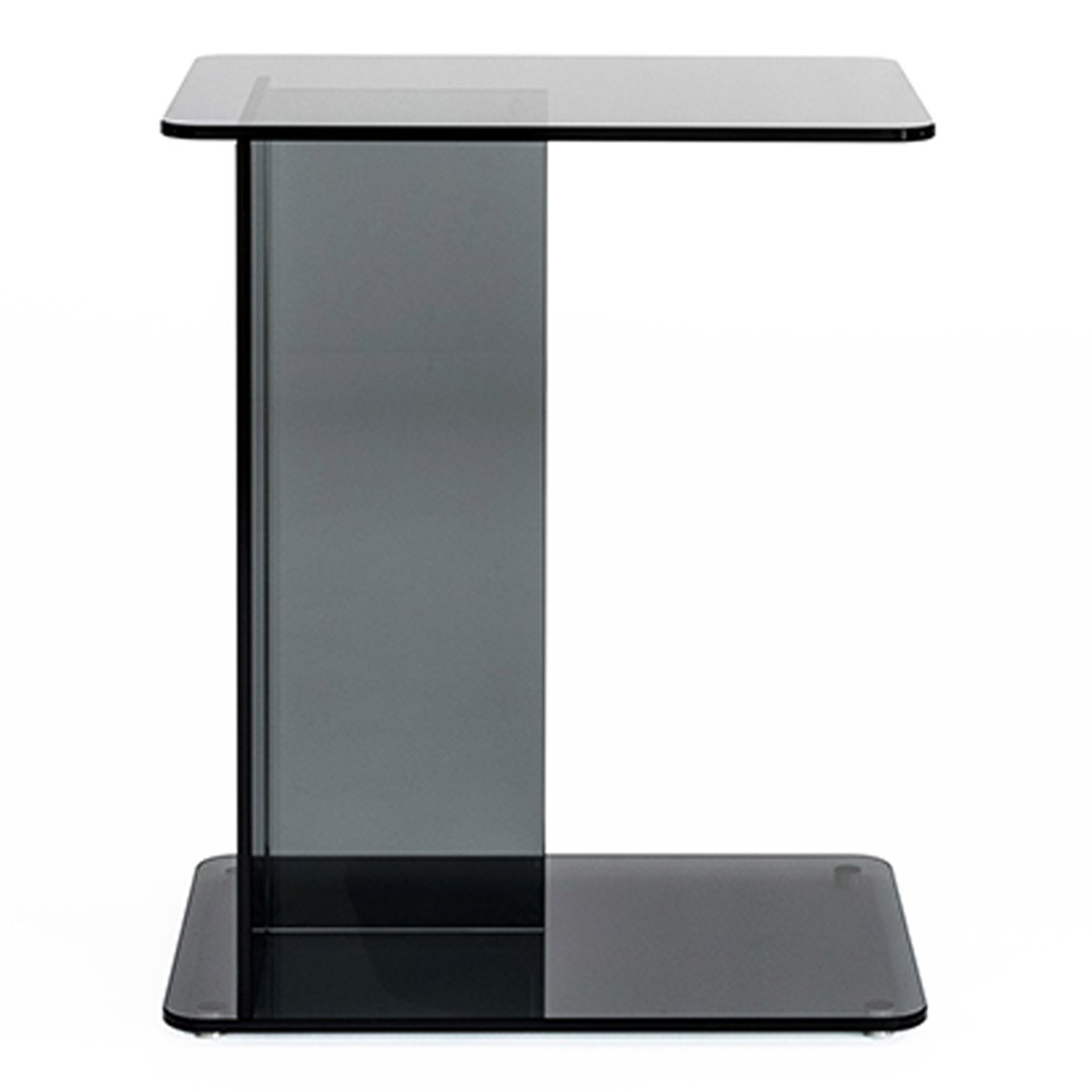 Modern clear glass side table in sleek black with a minimalist design and smooth patterns. Perfect for contemporary decor.
