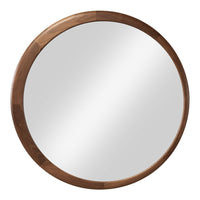 Round mirror with a natural wood frame, featuring a smooth, reflective surface and warm, earthy tones.