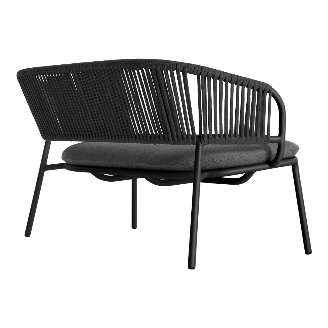 Black outdoor lounge chair with sleek, vertical slat design and a soft gray cushion. Ideal for modern decor.
