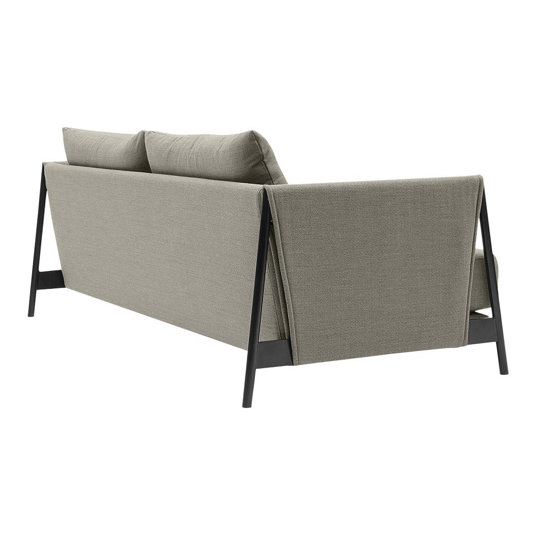 Gray upholstered sofa with three cushions and black angular frame, featuring a sleek, modern design.