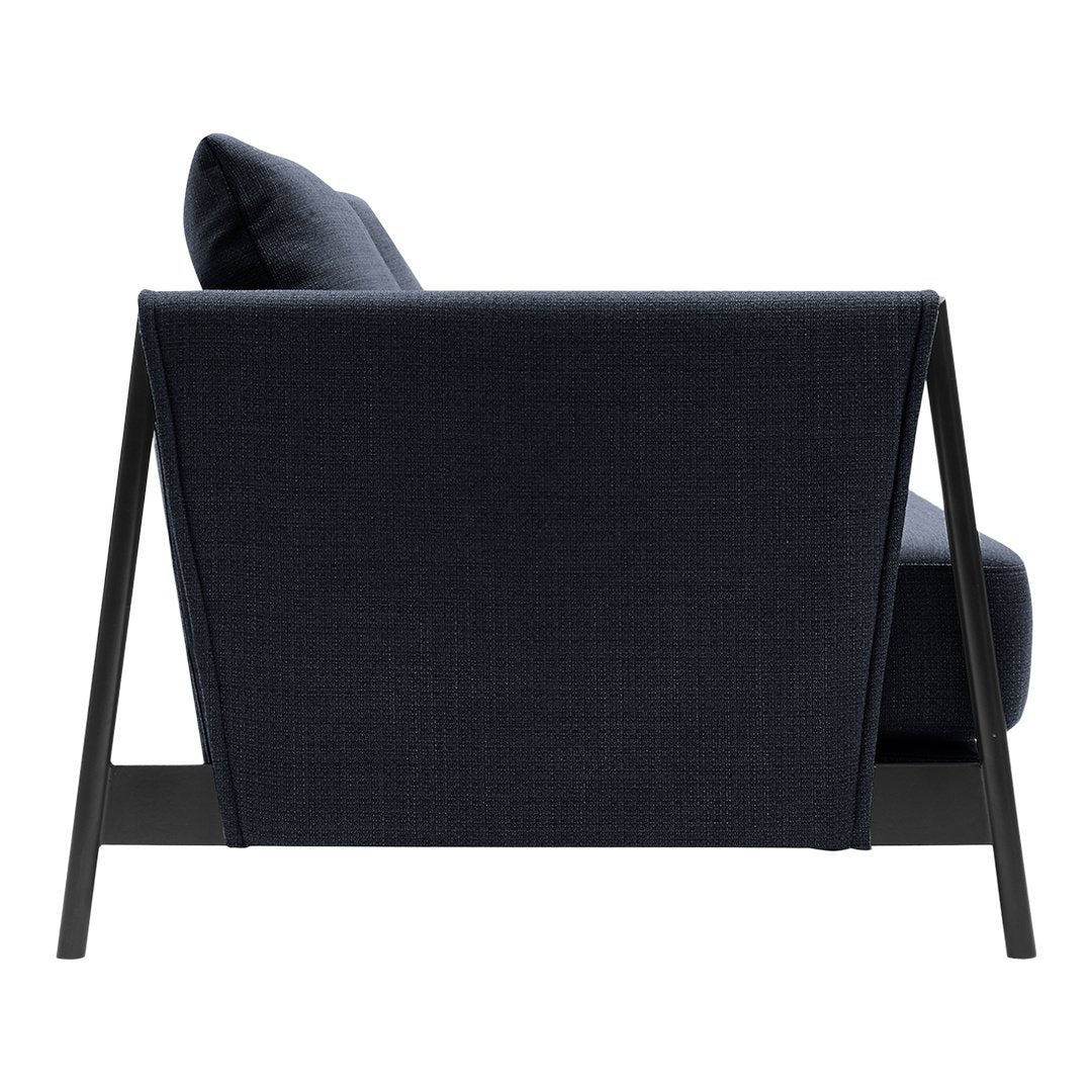 Navy blue fabric sofa with a textured pattern and a sleek black wooden frame. Ideal for modern decor.