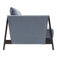 Light blue textured fabric sofa with a sleek black frame, showcasing a modern geometric design.