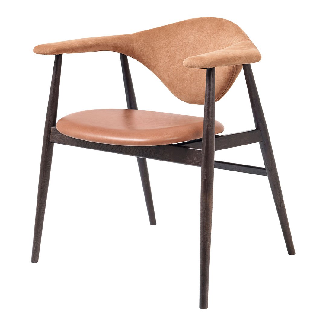 Mid-century modern chair with a tan suede seat and back, contrasting dark wooden legs and frame.