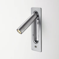 "Brushed silver wall-mounted reading light with sleek, modern design and minimalist pattern."