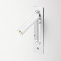 Sleek white LED wall light with a shiny chrome finish, featuring a minimalist design and modern aesthetic.
