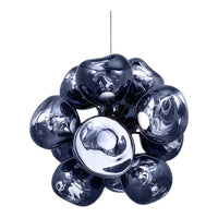 Shiny silver and deep navy blue pendant light with organic, rounded shapes and reflective surfaces.