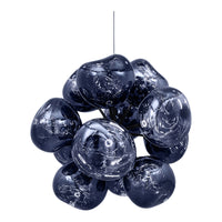 Modern navy blue glass pendant light with smooth, organic shapes and a marbled pattern, illuminating any space with style.