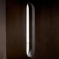 Sleek, minimalist design with a dark wood texture and smooth, elongated light cutout. Modern and chic.