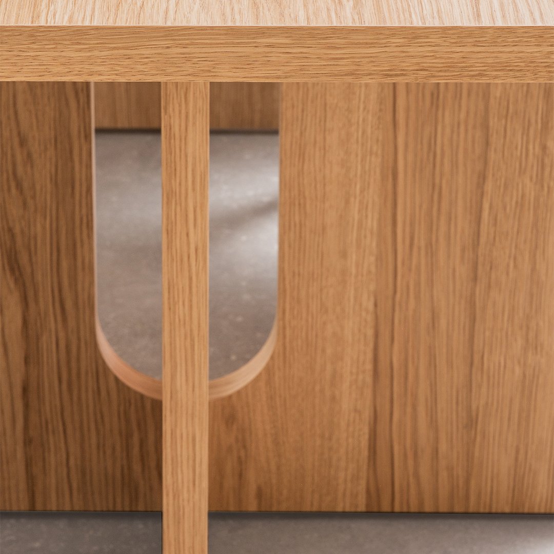 Light oak wood grain with sleek geometric cutouts, showcasing a warm, natural finish. Modern and stylish design.