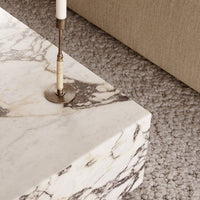 Elegant white marble coffee table with gray veining and a polished surface, perfect for modern living spaces.