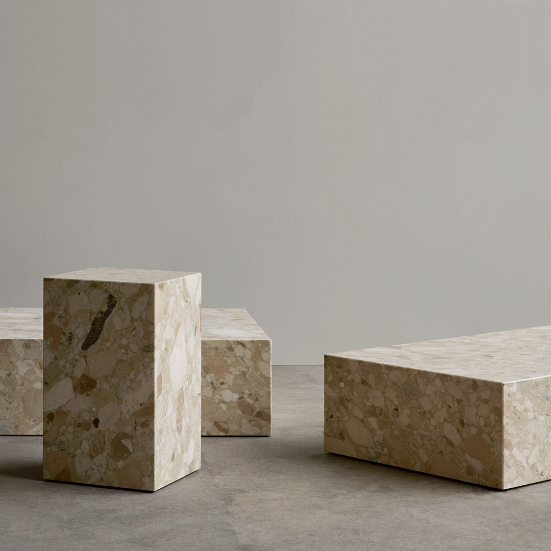Neutral beige marble blocks with subtle patterns, showcasing a modern, minimalist aesthetic for contemporary decor.